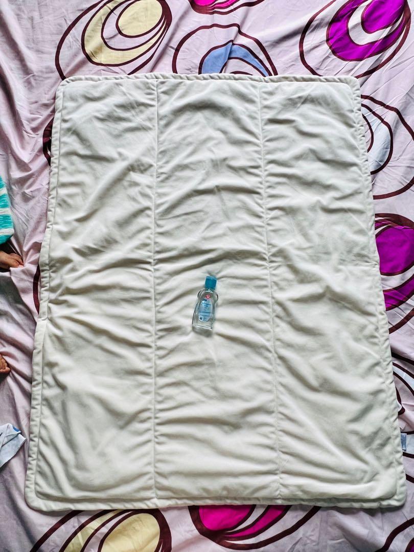 BLOOM beddings (rarely used) (Category: Children's Beds) located in Quezon City. Submitted by chizmax (Listing ID 1124880494, Image 2). Description: BLOOM BRAND. Soft and smooth, perfect for cribs and playpens. Can also be used as comforter or bed topper. Rarely used and in good condition. (Pix with bottle for size perspective). .