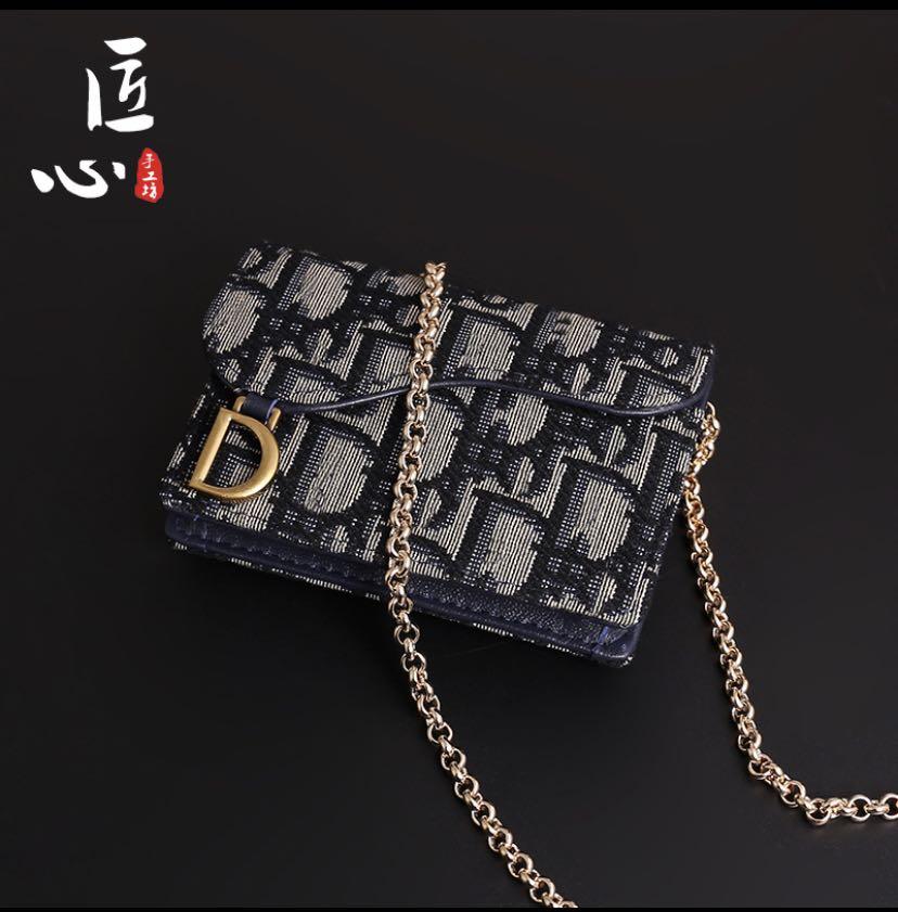 Dior chain hotsell on wallet
