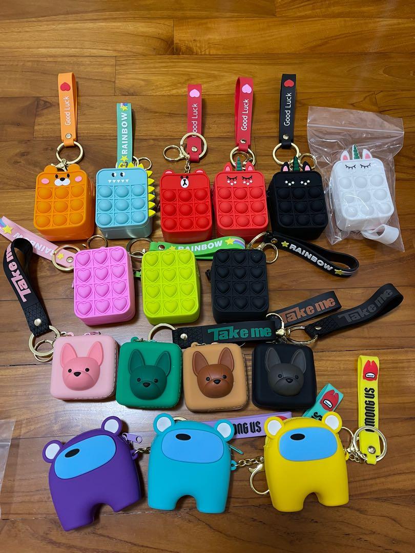 Fidget pop it pouch / among us pouch/ Dog pouch (Category: Toys & Collectibles) located in Singapore. Submitted by claw1234 (Listing ID 1124849193, Image 1). Description: Fidget pop it pouch / among us pouch Selling 1 for $4.50 .