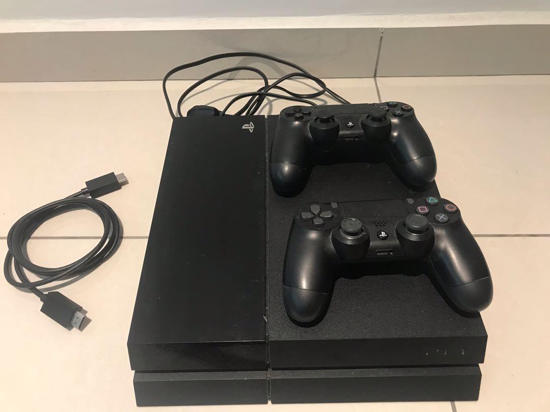 Second hand ps4 with 2 controllers new arrivals