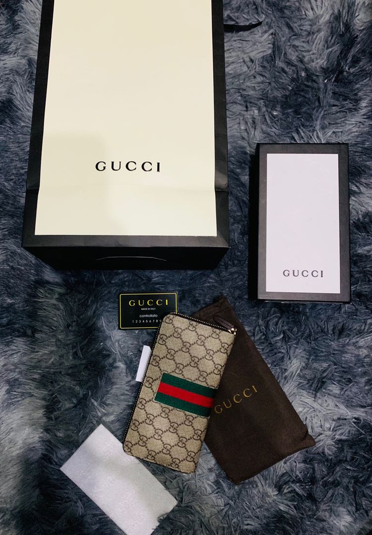 Gucci Clutch wallet, Luxury, Bags & Wallets on Carousell