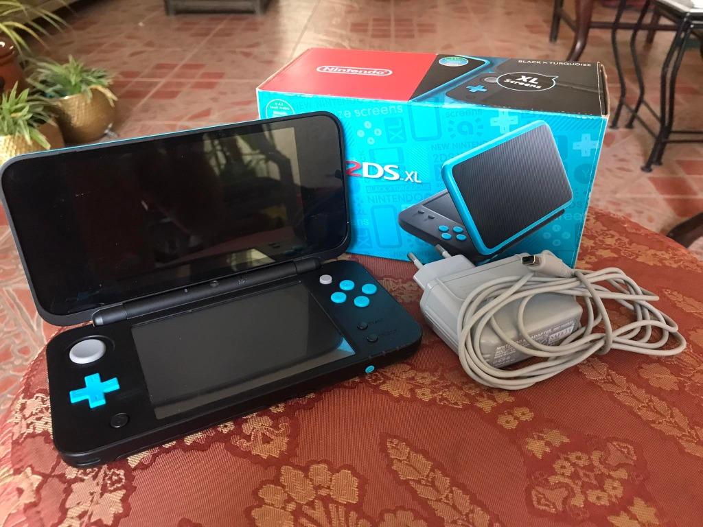 New Nintendo 2ds Xl Black X Turquoise 64gb Memory Card Full Of Games Video Gaming Video Game Consoles Nintendo On Carousell