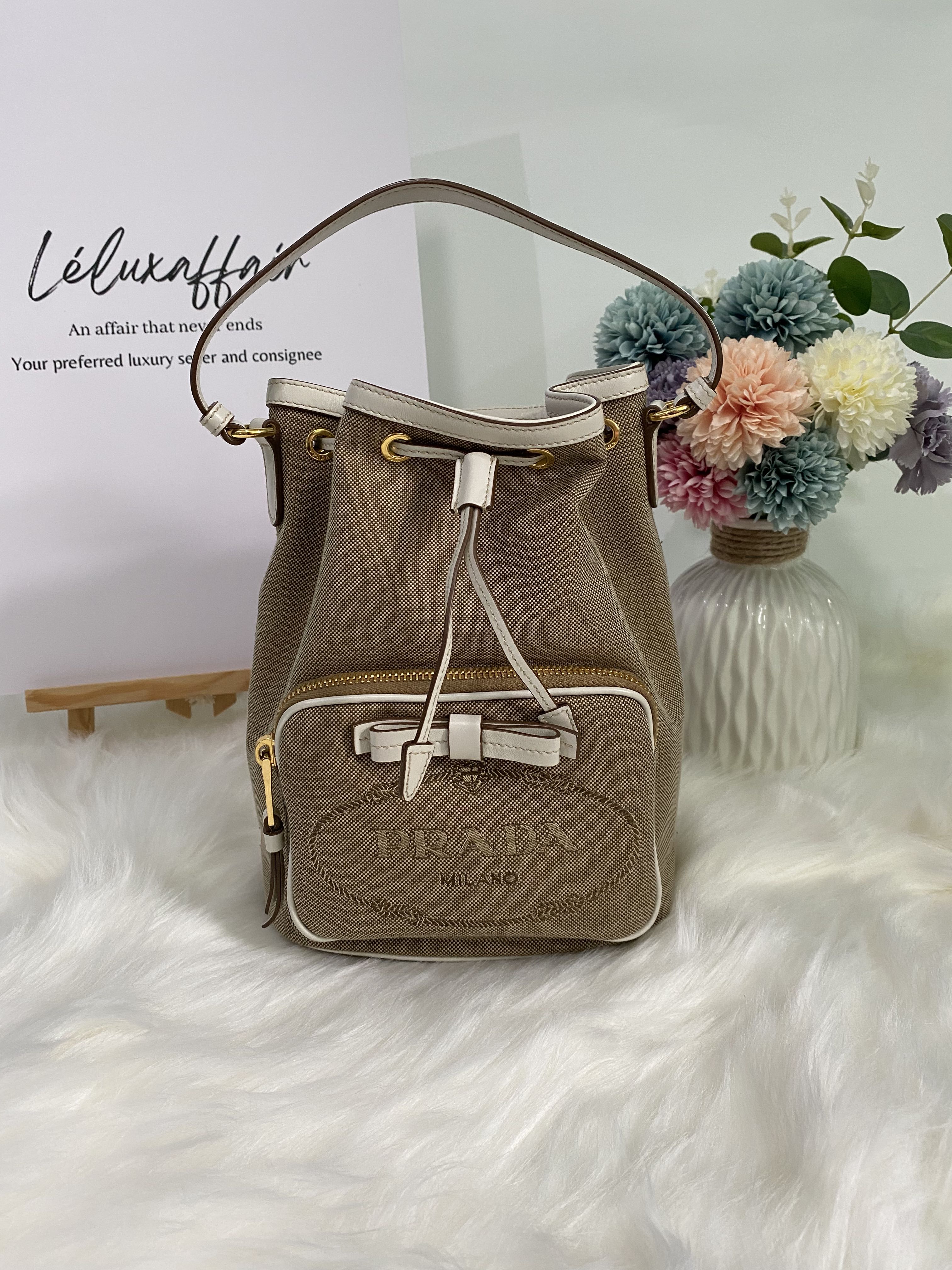 Prada canvas 2025 bucket bag