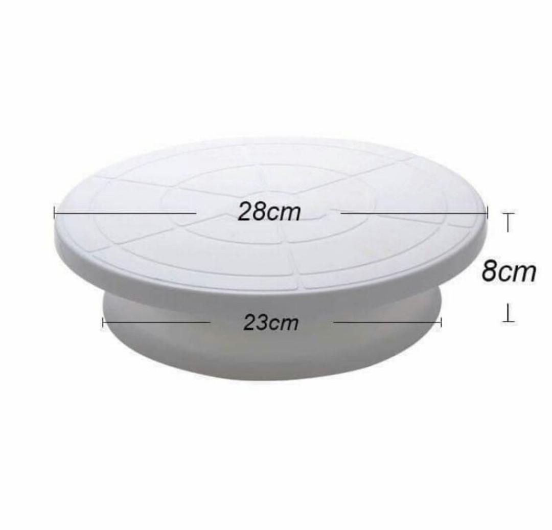 28cm Cake Decorating Turntable Round Cake Stand (NO BOX P135) (Category: Bakeware) located in Quezon City. Submitted by maica.store (Listing ID 1061699744, Image 2). Description: No box = P135.00 Product Description: *28cm Rotating Cake Icing Decorating Revolving Kitchen Display Stand Turntable *100% brand new and high quality *Made of high quality material, durable and practical to use *Material: PP Plastic *Size (Approx.): Rotating platform dia