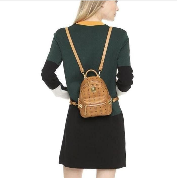MCM mini back pack sling bag Luxury Bags Wallets on Carousell