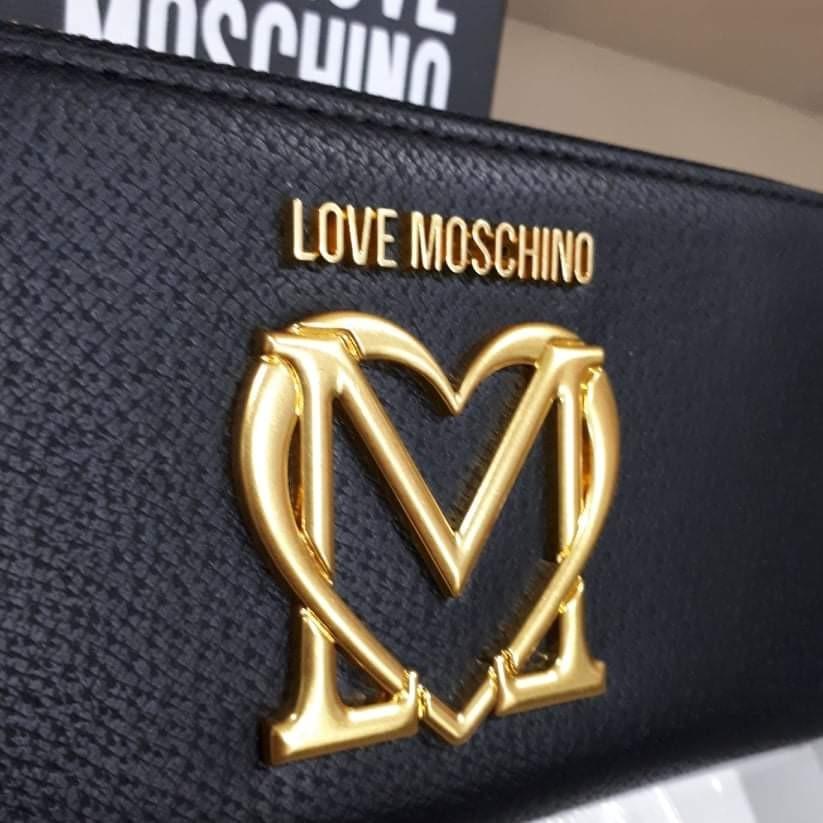 Moschino Long Zipper Wallet (Category: Luxury Bags & Wallets) located in Taguig. Submitted by esa.agustin (Listing ID 1125305746, Image 2). Description: Original Moschino black leather long zippet wallet. With tag, carecard and box. Bought in Italy..