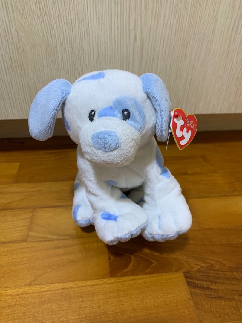 Blue and store white stuffed dog