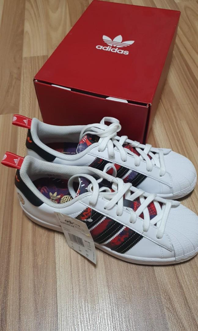 Adidas originals clearance red sneakers