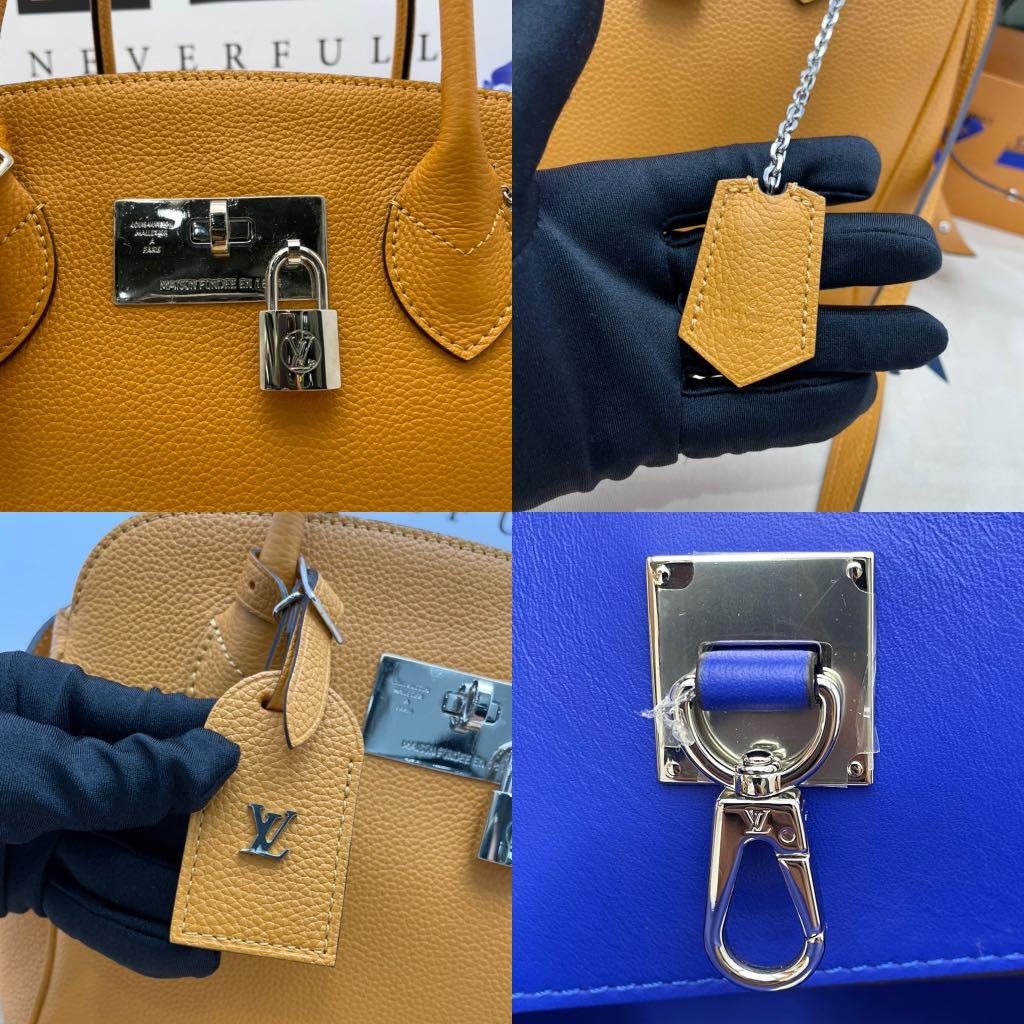 Sold at Auction: Louis Vuitton, Louis Vuitton, Milla PM Saffron Bag