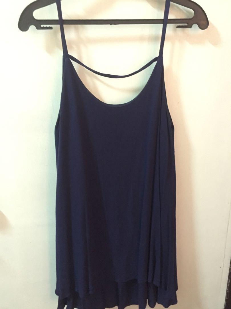 Low back dress (Category: Dresses) located in Manila. Submitted by futuremd_ (Listing ID 1125541169, Image 1). Description: Used once. Low back dress. Can be used with inner white shirt. Perfect when used with white sneakers :) Can fit M- L.