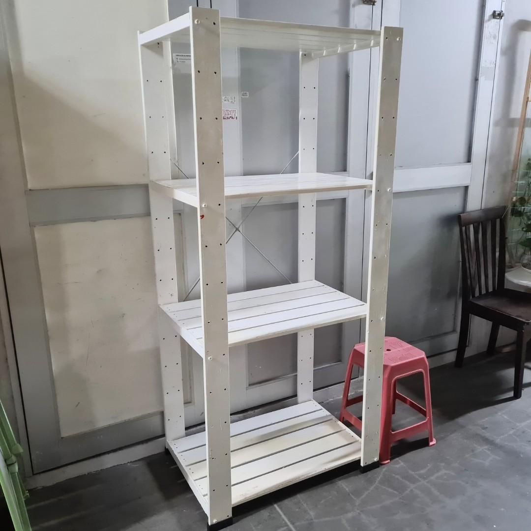 Ikea tall white wood shelf rack. Storeroom, plant pot display