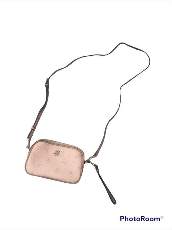 Used COACH JES CROSSBODY SIGNATURE CANVAS WITH HEART FLORAL PRINT