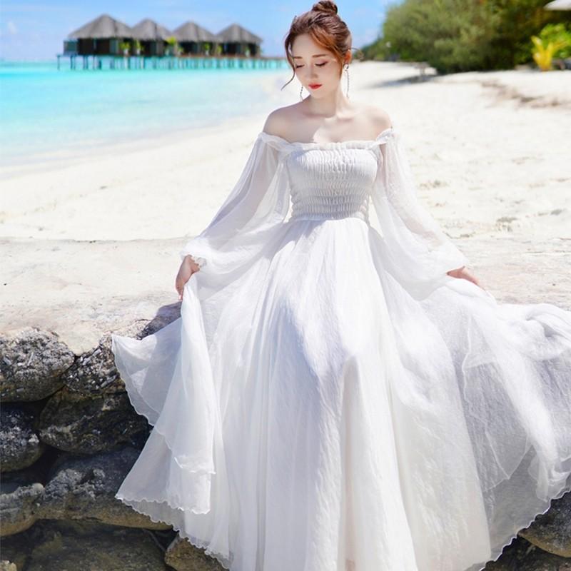 White flowy off shoulder dress