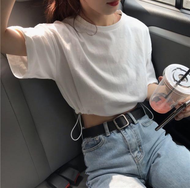 Solid cropped drawstring top (Category: Shirts) located in Singapore. Submitted by shopinspring (Listing ID 1125899650, Image 1). Description: measurements: bust - 104 cm shoulder width - 53 cm sleeve length - 18 cm length - 43 cm only white available ✅ can be worn as oversized fit too 💯.
