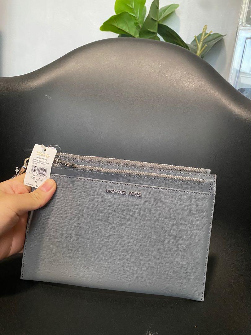Grey michael kors wristlet top