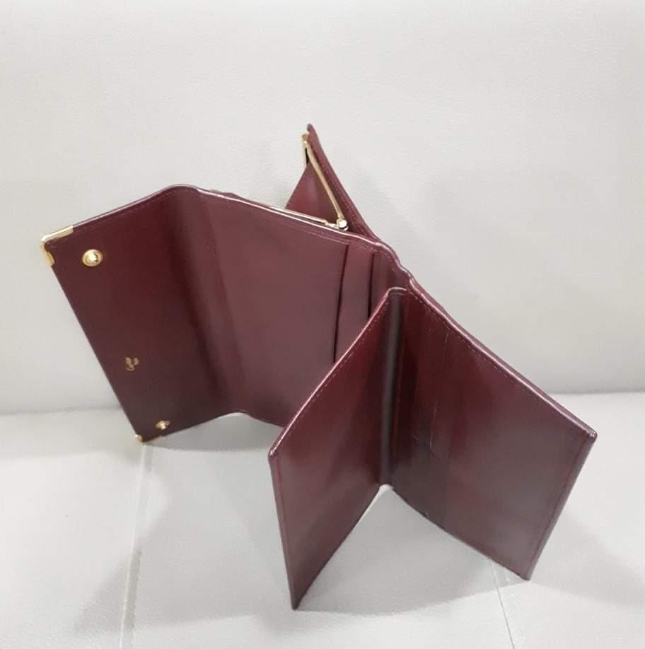 Cartier Tri Fold Long Wallet (Category: Luxury Bags & Wallets) located in Taguig. Submitted by esa.agustin (Listing ID 1126036976, Image 3). Description: Original Cartier maroon tri fold long wallet. In very good condition. With authenticity card..