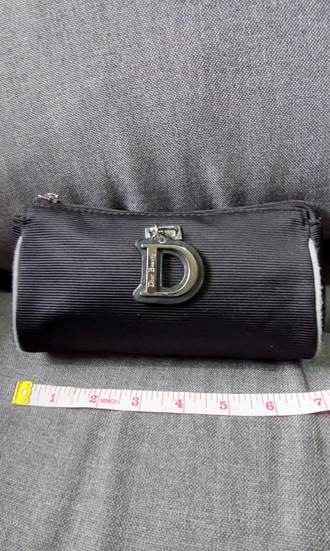 Christian Dior D pouch (Category: Luxury Bags & Wallets) located in Baguio. Submitted by lotus_blossom (Listing ID 1125940350, Image 1). Description: Please check all posted pics JRS shipping.