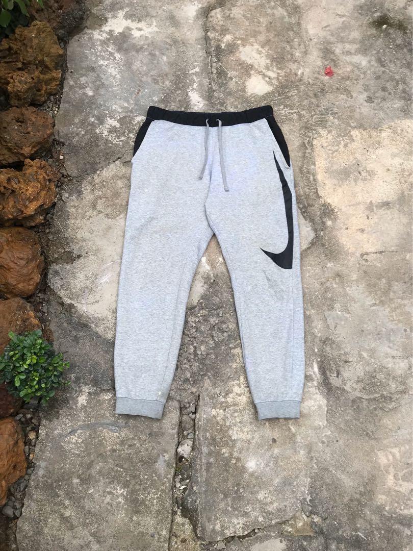 Nike sweatpants with big swoosh outlet