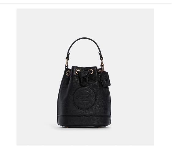 COACH Dempsey Drawstring Bucket Bag 15 With Coach Patch (Category: Luxury Bags & Wallets) located in Muntinlupa City. Submitted by mumurahin (Listing ID 1126324611, Image 1). Description: Bought in USA website Brand new. Still with tags / in original packaging Can provide receipt to prove authentication. .