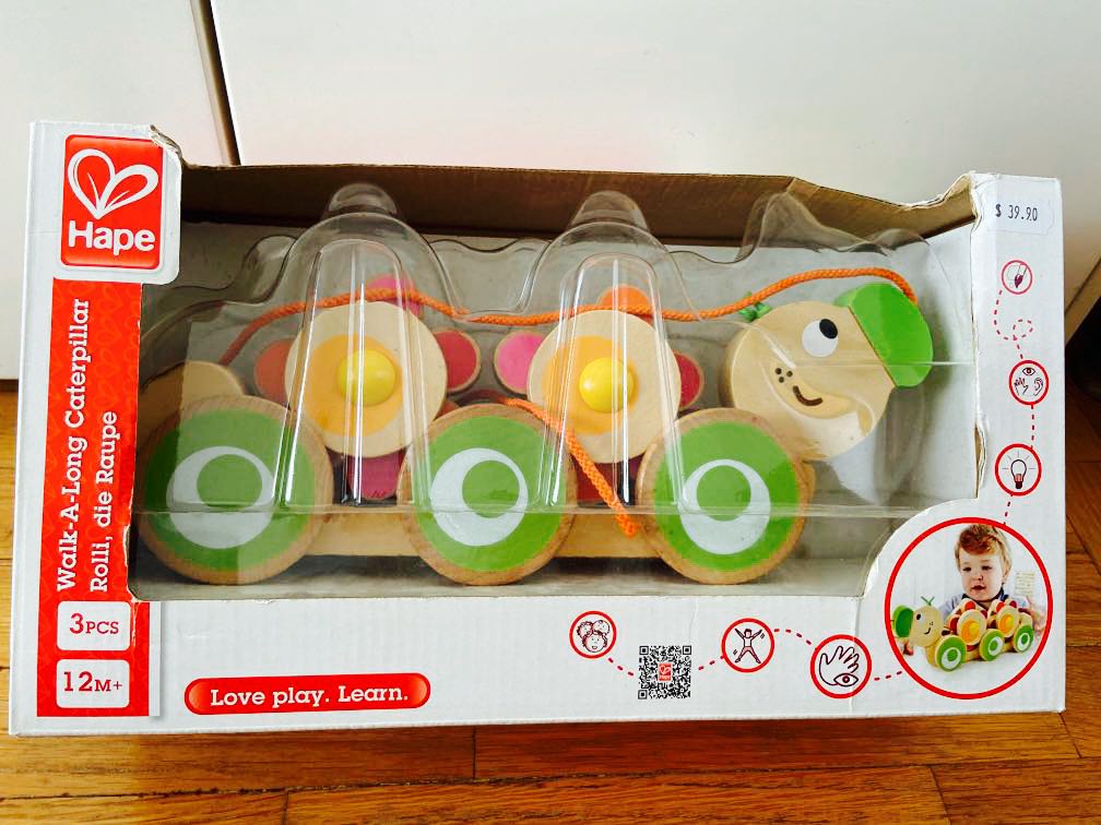 Hape Walk A Long Caterpillar Pull Wooden Montessori Toy Sunflowers that move as you pull hungry caterpillar story
