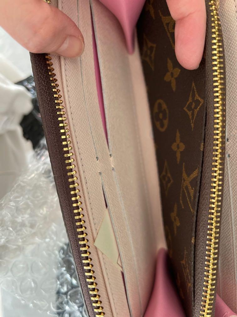 Lv long wallet with zip ( inside pink or purple leather )