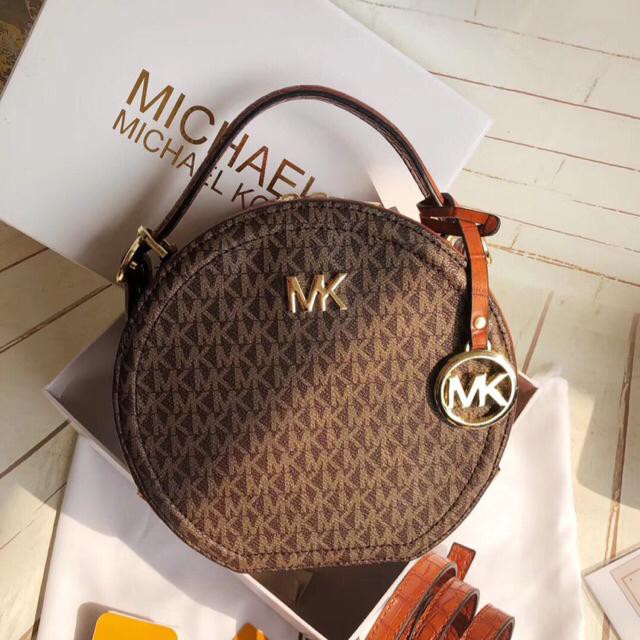 mk round sling bag