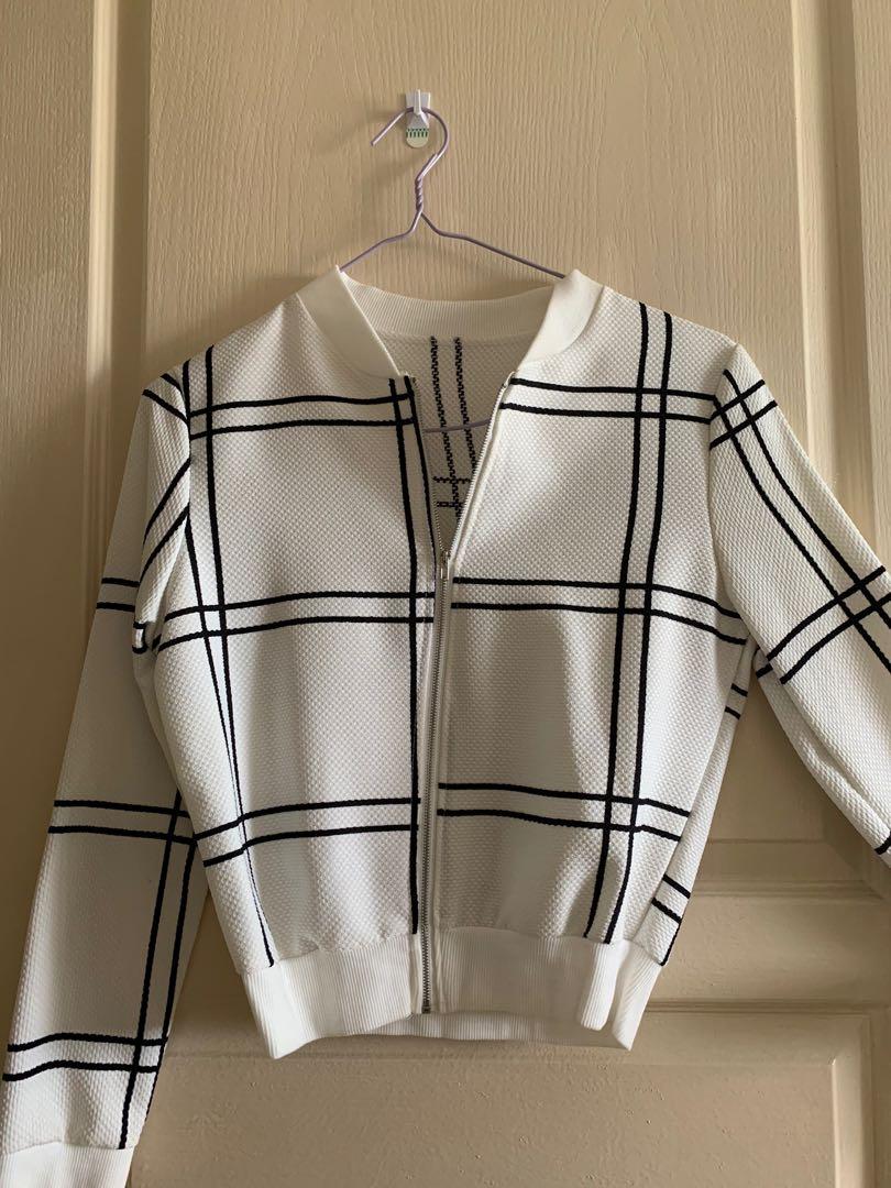 B&w grid jacket (Category: Coats, Jackets and Outerwear) located in Singapore. Submitted by sweetxnothingx (Listing ID 1126416396, Image 1). Description: Brand new never worn. PTP: 47cm Length: 52cm.