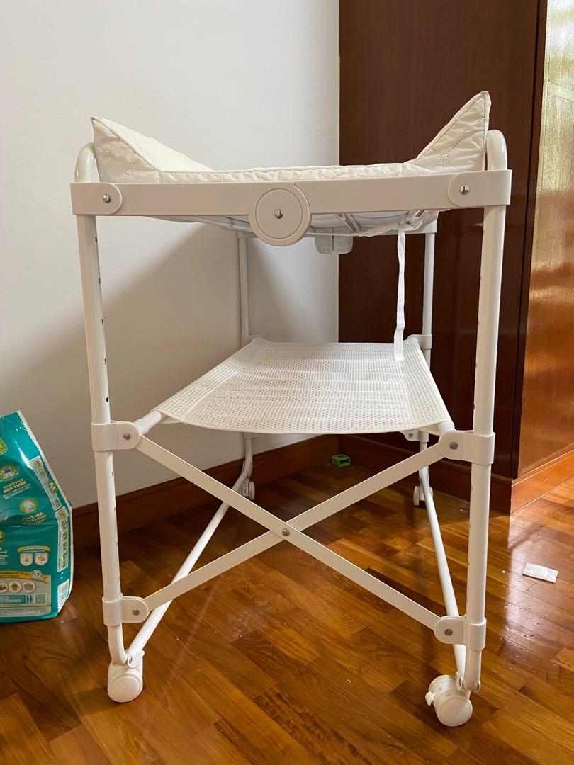 Compact changing table with lockable wheels, Babies & Kids, Bathing