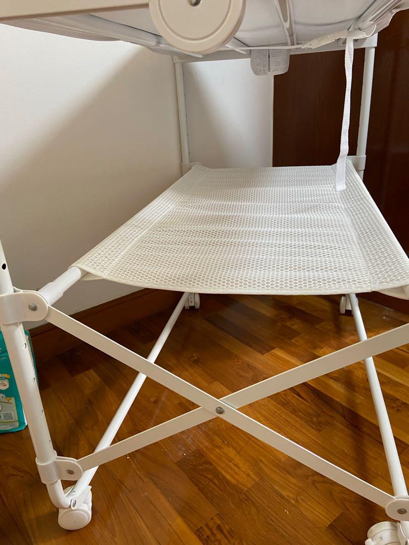Compact changing table with lockable wheels, Babies & Kids, Bathing