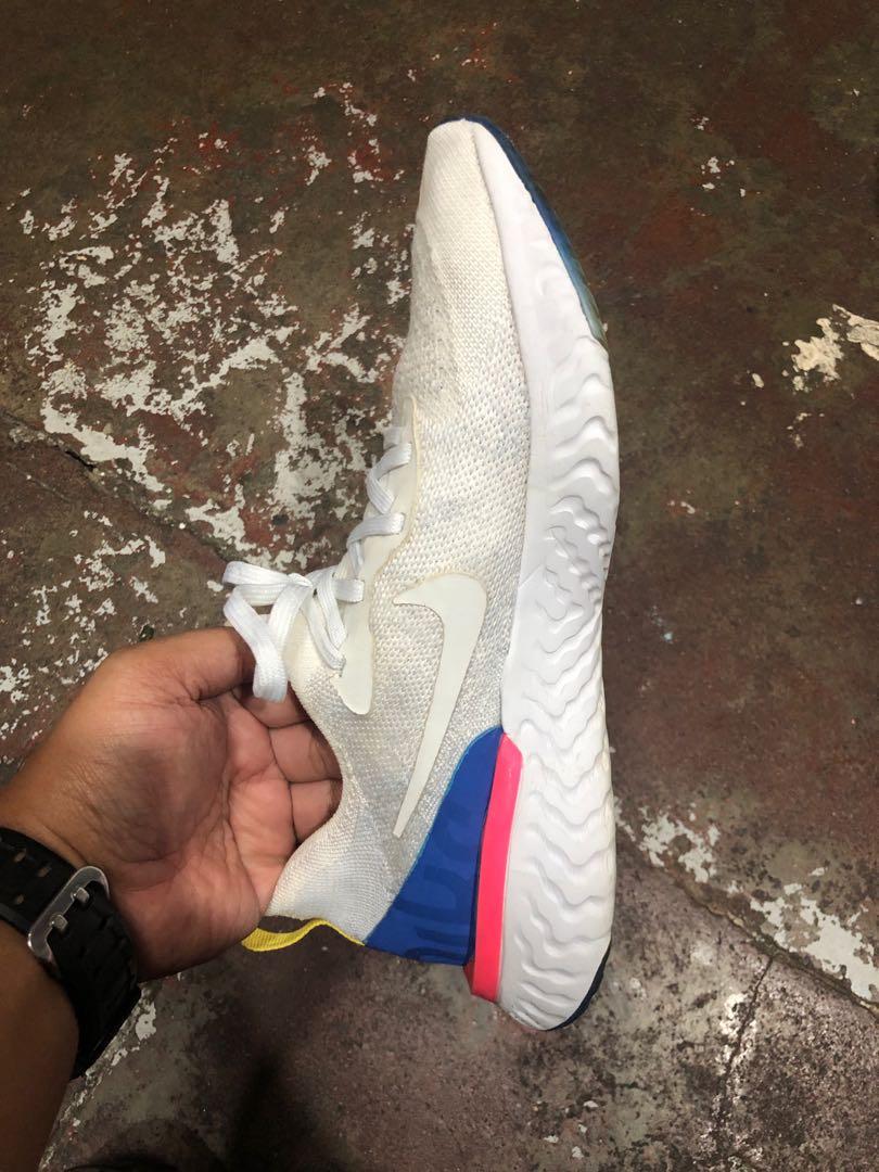 Nike Epic React Flyknit Running White/Blue/Pink (27 cm) (Category: Sneakers) located in Baguio. Submitted by master_of_brands (Listing ID 1126452757, Image 3). Description: Authentic Nike Epic React Flyknit Running White/Blue Mens 9 US/42.5 Europe/27 cm Slightly used Minor issue: replaced insole pads but still original from nike react flyknit also Thick outsole No sole separation In excellent condition In excellent condition .