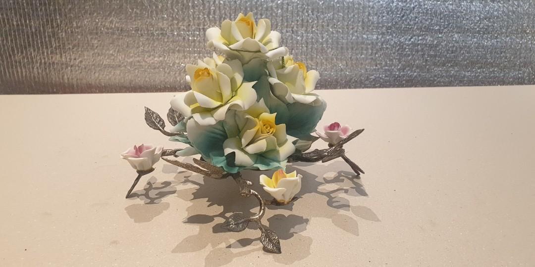 Ceramic Flower Display (Category: Artificial Plants & Flowers) located in Manila. Submitted by zandre615 (Listing ID 1126663604, Image 1). Description: Ceramic flower display for sale silver plated stem & leaves Handcrafted in Italy Height 7", lenght 11" Add shipping.