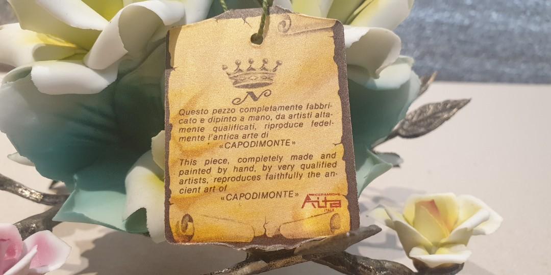 Ceramic Flower Display (Category: Artificial Plants & Flowers) located in Manila. Submitted by zandre615 (Listing ID 1126663604, Image 3). Description: Ceramic flower display for sale silver plated stem & leaves Handcrafted in Italy Height 7", lenght 11" Add shipping.