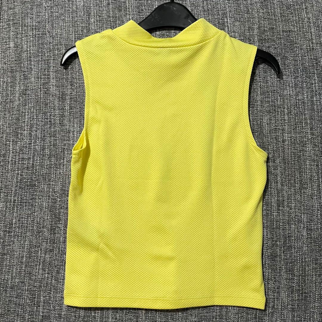 H&M Sleeveless Crop Top (Category: Sleeveless) located in Quezon City. Submitted by savespaces (Listing ID 1126674252, Image 2). Description: H&M Tight Sleeveless Crop Top • size: s • matingkad na yellow • used thrice, good condition, with tag • hugs ur torso talaga :> • can send photos of how it looks like when worn, feel free to message! •can do Shopee checkouts 🧡 rfs: decluttering.