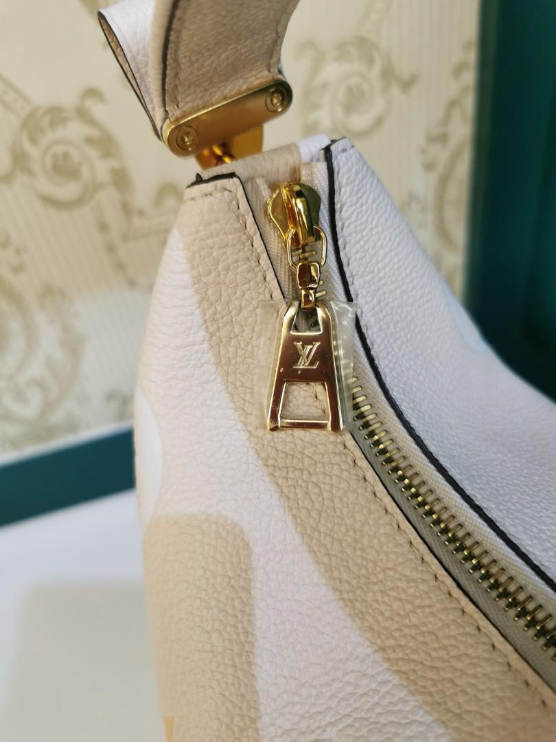 Louis Vuitton Monogram Empreinte Marshmallow Hobo
