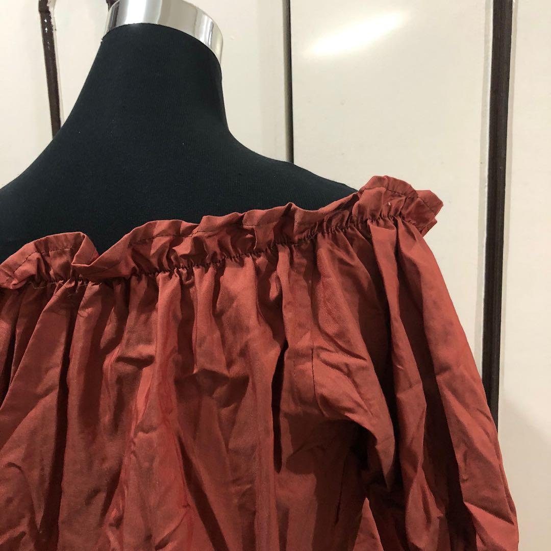 Off the rust shoulder top (free size) (Category: Blouses) located in Marikina City. Submitted by mpaurf (Listing ID 1126570083, Image 3). Description: Decluttering sale! Selling my personal preloved clothes! 🌸 - fits S to L frames - rust color - used once - payment via BDO/GCash - shipping via Lalamove, Grab or J&T - meet-up in Marikina (with handling fee).
