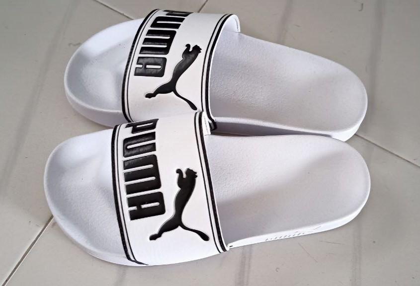 brand NEW Puma Sliders size US4