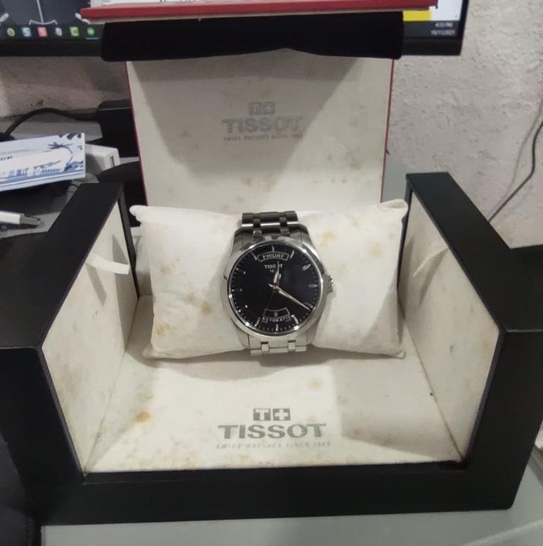 Tissot Men s T0354071105100 Couturier Day Date Calendar Watch. AUTOMATIC. SWISS MADE