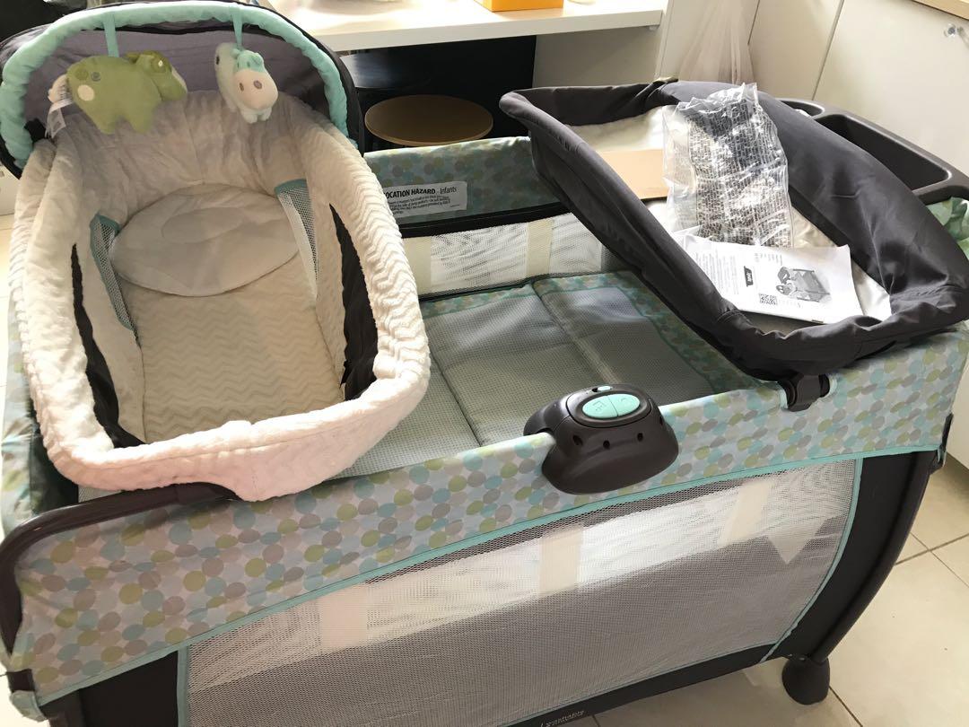 Ingenuity washable playard deluxe with dream centre top