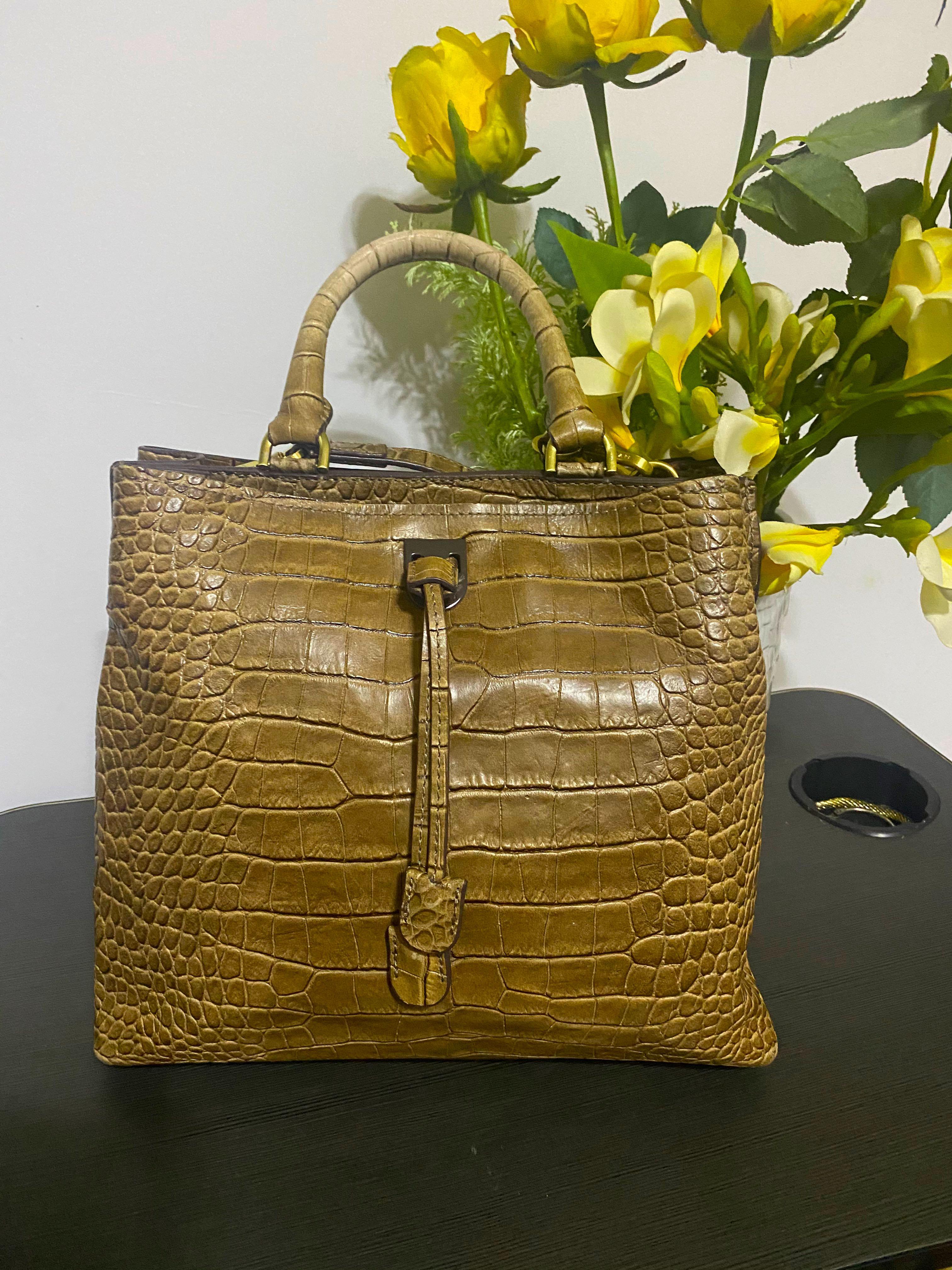 Genuine Crocodile Leather Hand Sling Bag (Category: Luxury Bags & Wallets) located in Pasay City. Submitted by heraeus5 (Listing ID 1123316835, Image 2). Description: Preloved in excellent condition. Negotiable. .