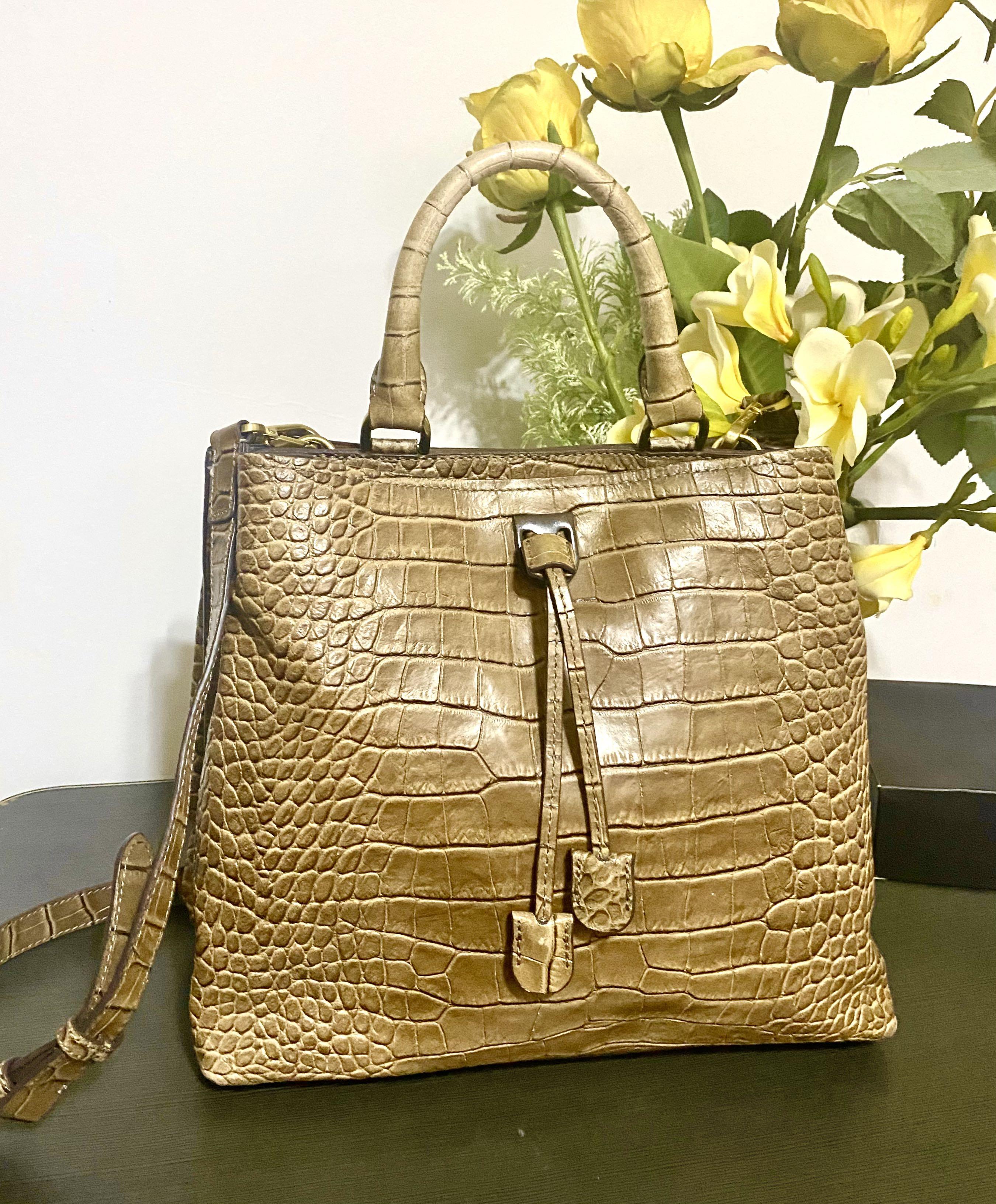 Genuine Crocodile Leather Hand Sling Bag (Category: Luxury Bags & Wallets) located in Pasay City. Submitted by heraeus5 (Listing ID 1123316835, Image 1). Description: Preloved in excellent condition. Negotiable. .