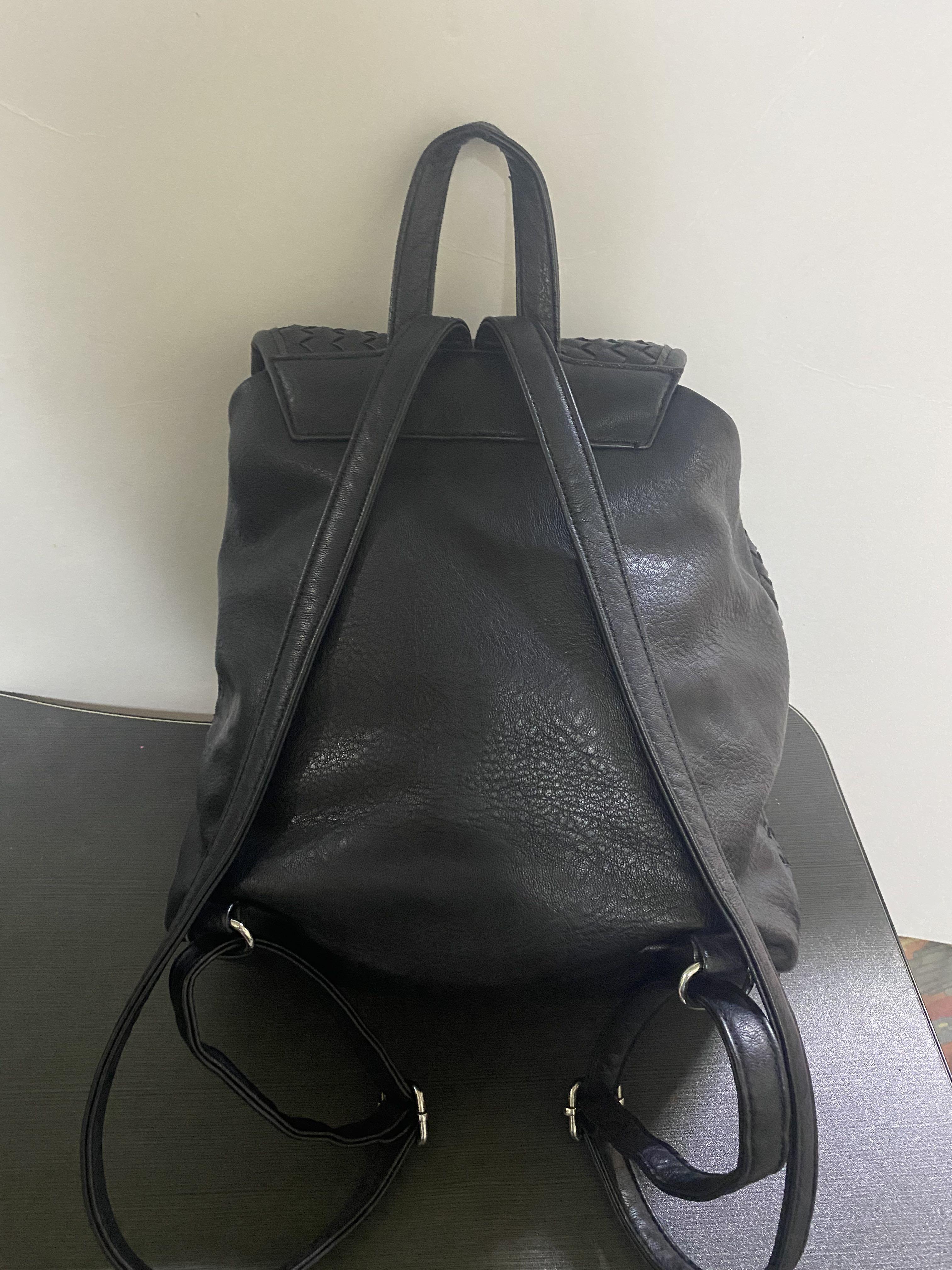 Intrecciato Weaved Leather Backpack (Category: Backpacks) located in Pasay City. Submitted by heraeus5 (Listing ID 1123316652, Image 2). Description: Preloved in good condition. Negotiable. .