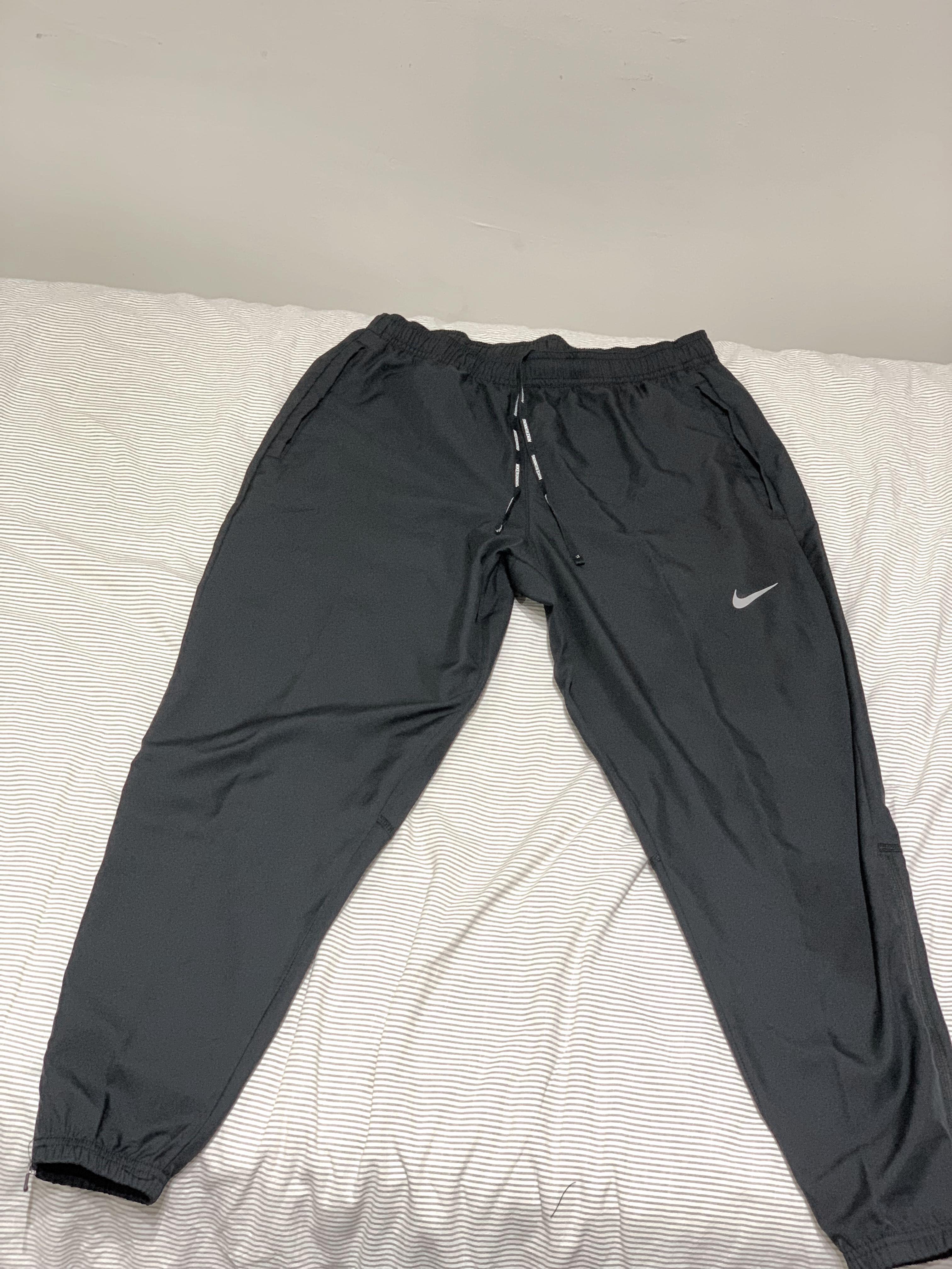 Nike woven running pants sales
