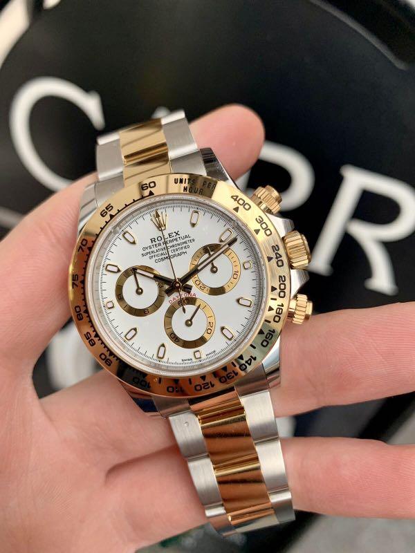 Rolex daytona clearance gold bezel