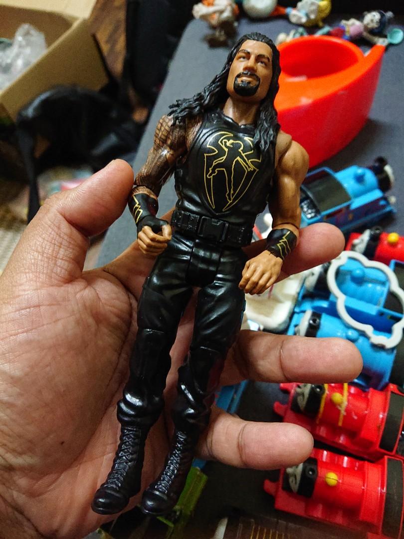 WWE Sound Slammers Roman Reigns, Hobbies  Toys, Collectibles   Memorabilia, Fan Merchandise on Carousell