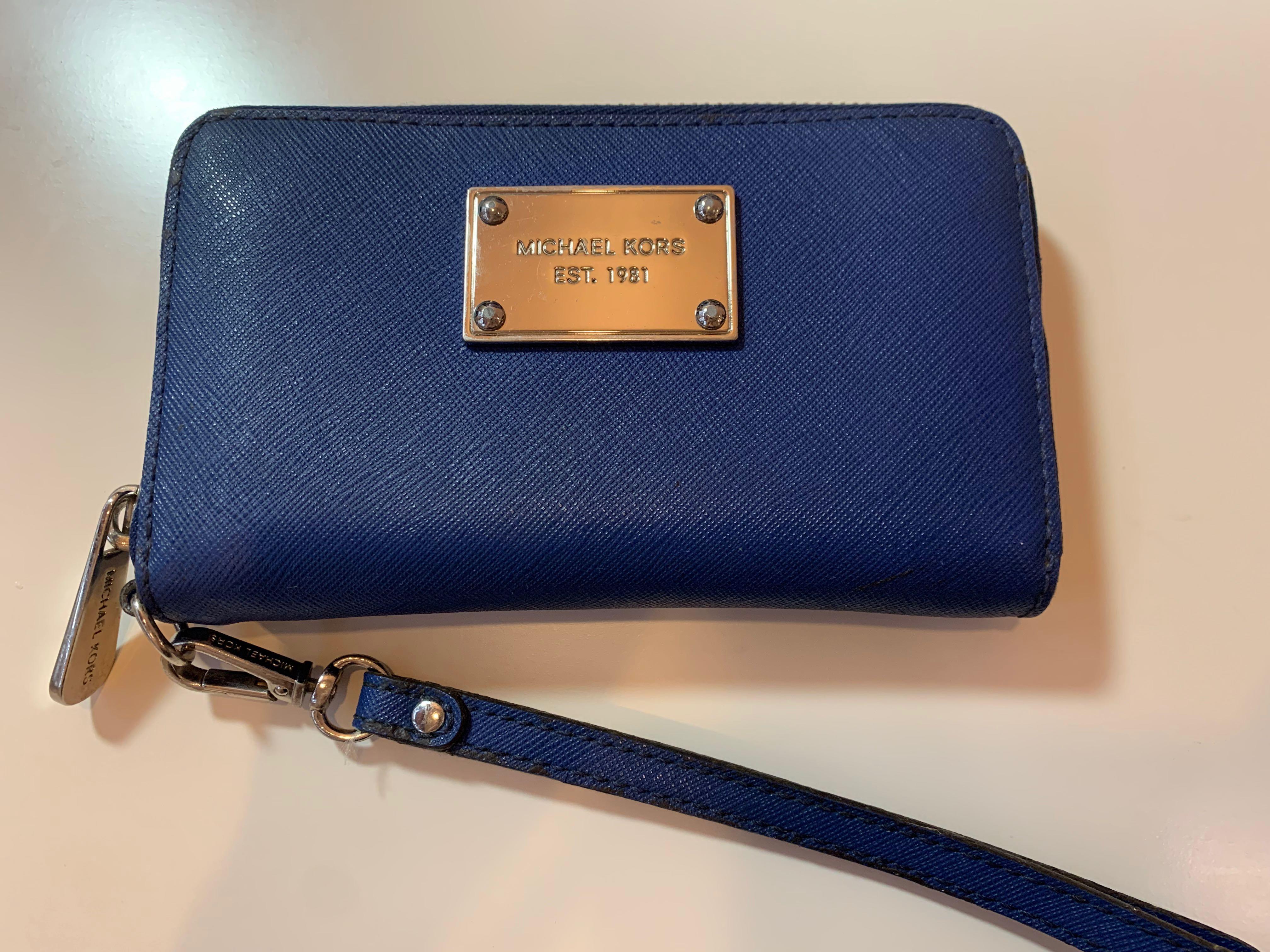 Michael Kors Saffiano Blue Leather Zip Wallet, Women's Fashion, Bags &  Wallets, Purses & Pouches on Carousell