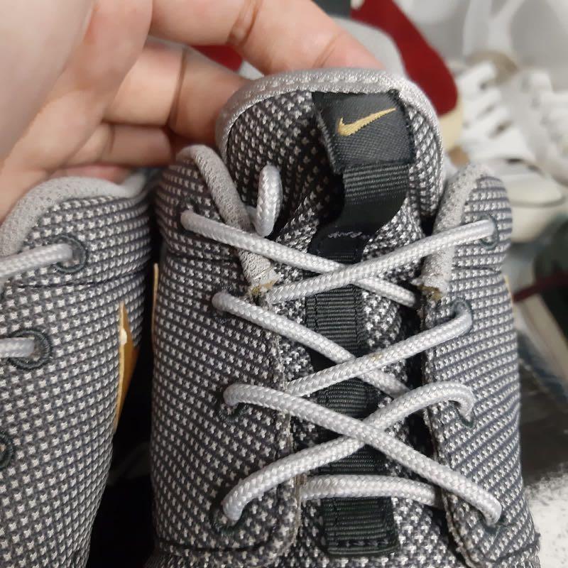 nike grey and gold shoes