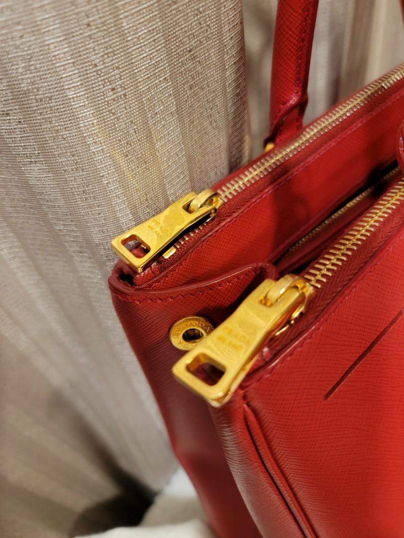 PRADA Saffiano Lux Double Zip (Category: Luxury Bags & Wallets) located in Quezon City. Submitted by travelali (Listing ID 1020023202, Image 2). Description: one of Prada's classic bag that will never go out of style. 3 way to wear, handbag shoulder bag crossbody! used less than 5x. bought in Prada Singapore. photocopy of receipt will be given. last photo for peg from web.