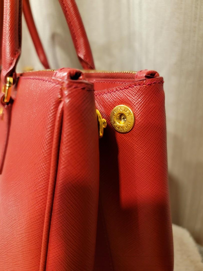 PRADA Saffiano Lux Double Zip (Category: Luxury Bags & Wallets) located in Quezon City. Submitted by travelali (Listing ID 1020023202, Image 3). Description: one of Prada's classic bag that will never go out of style. 3 way to wear, handbag shoulder bag crossbody! used less than 5x. bought in Prada Singapore. photocopy of receipt will be given. last photo for peg from web.