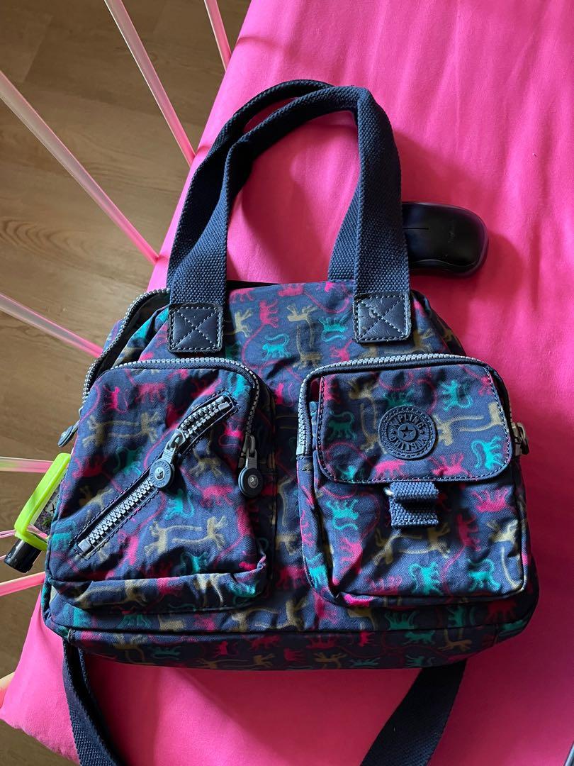SALE REDUCED PRICE Used KIPLING Sling Bag great for VTL TRAVEL With long sling for crossbody flaw as tote handle front back peeled off
