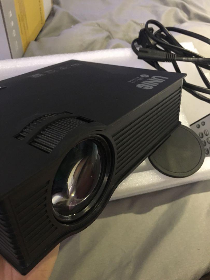 UNIC Projector 1800 lumens uc68 (Category: Projectors) located in Marikina City. Submitted by luisitoo (Listing ID 1126762190, Image 3). Description: Price slightly negotiable, just pm me. Bought from Shopee for 2,999. Well used, an ok projector i could say. Used this as a temporary room tv Price reduced from 2500 to 2000 only! Rfs: bought a tv.